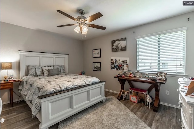 bedroom featuring ceiling fan and dark hardwood / wood-style flooring