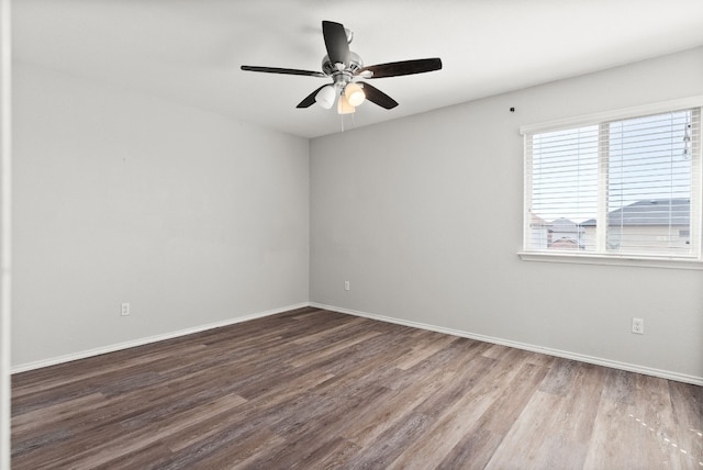 unfurnished room featuring hardwood / wood-style flooring and ceiling fan