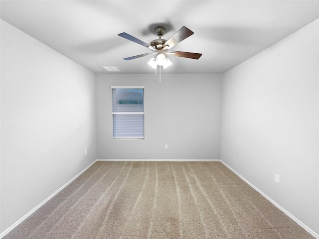 empty room with carpet and ceiling fan