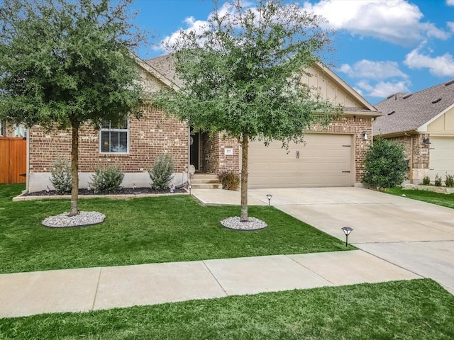 view of front of home with a garage and a front lawn