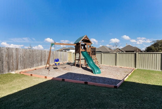 view of playground featuring a lawn