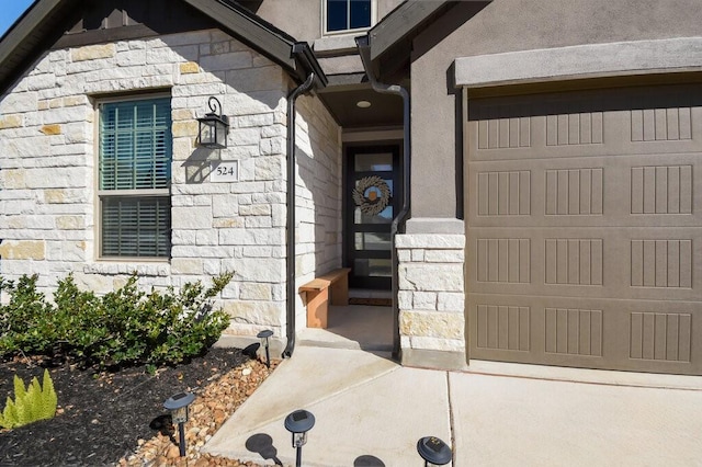 property entrance with a garage