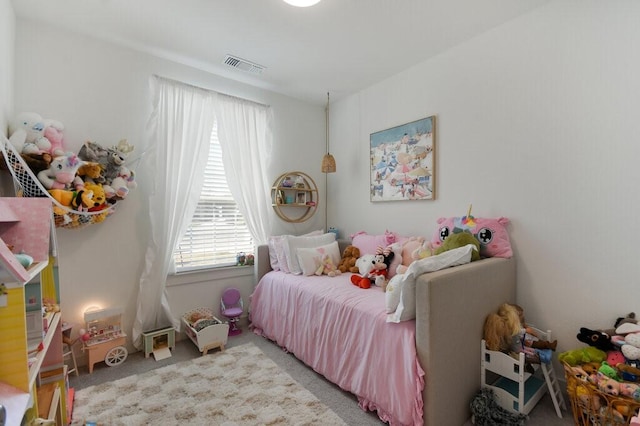 bedroom featuring carpet