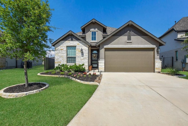 524 Calmo Ct, Liberty Hill, TX 78642 - craftsman inspired home featuring stone siding, stucco siding, concrete driveway, and an attached garage