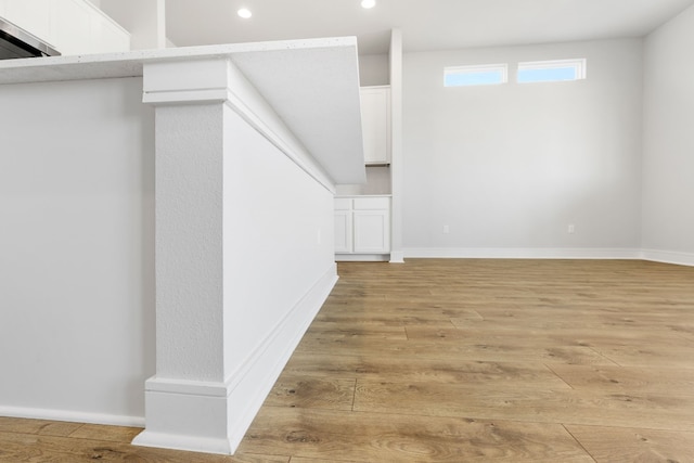 basement featuring light wood-type flooring