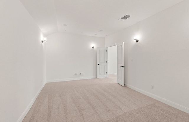 3813 Gabriels Horn Rd, Leander, TX 78641 - empty room with light carpet, vaulted ceiling, and baseboards