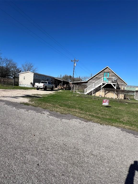 view of front of home with a front yard