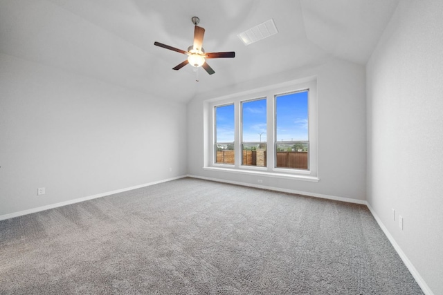 409 Raleigh Dr, Georgetown, TX 78633 - carpeted empty room featuring lofted ceiling and ceiling fan