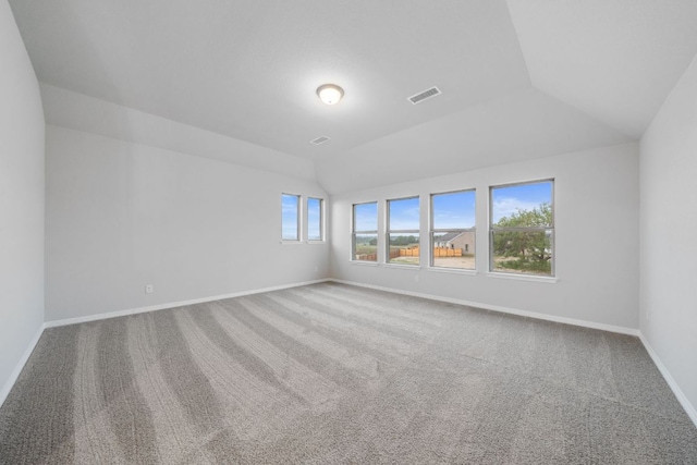 409 Raleigh Dr, Georgetown, TX 78633 - carpeted empty room with lofted ceiling and baseboards