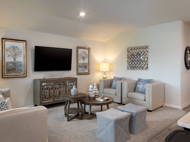 living room with vaulted ceiling