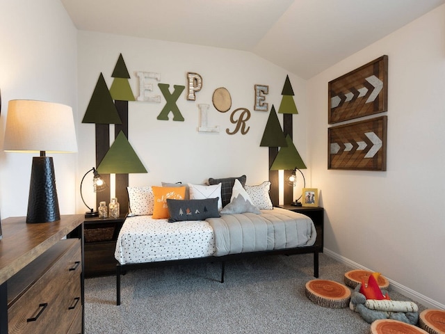 bedroom featuring carpet flooring and lofted ceiling