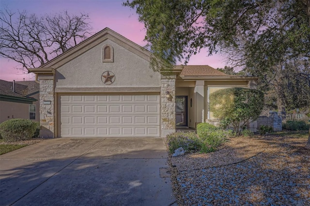 view of front of property with a garage