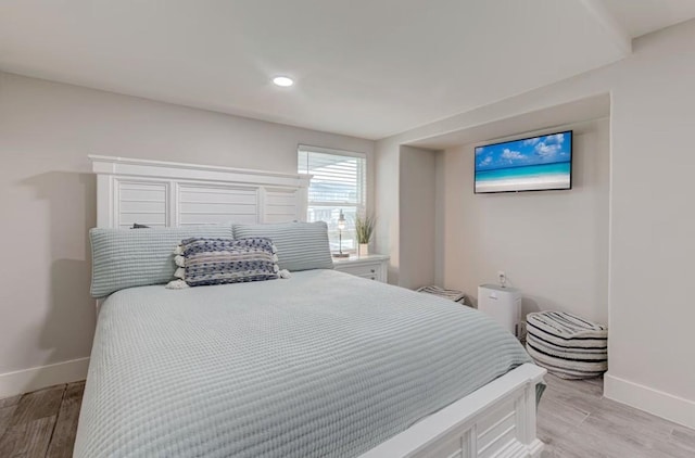 bedroom featuring light hardwood / wood-style floors