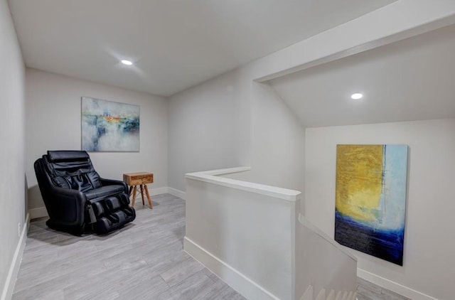 living area with light hardwood / wood-style floors