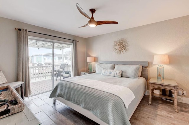 bedroom featuring access to exterior and ceiling fan