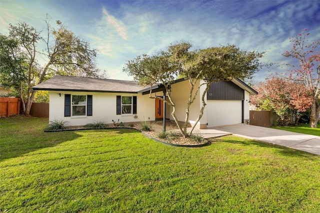 ranch-style house with a front yard and a garage