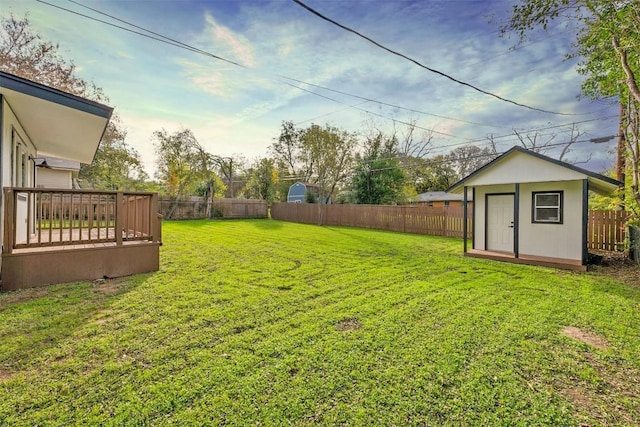 view of yard featuring a storage unit