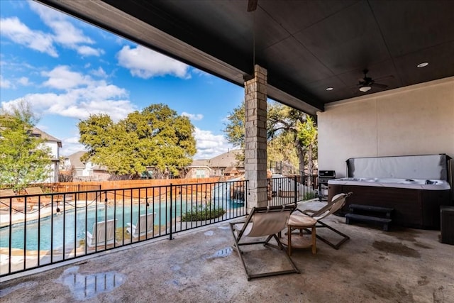 view of patio with ceiling fan, a fenced backyard, a fenced in pool, and a hot tub