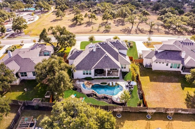 birds eye view of property with a residential view