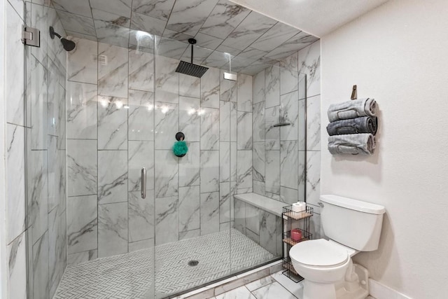 bathroom with toilet and walk in shower