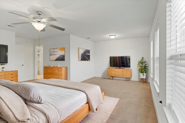 bedroom featuring ceiling fan and light colored carpet