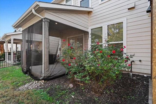 7411 Merrick Ln Unit 39, Austin, TX 78745 - view of side of home with a sunroom