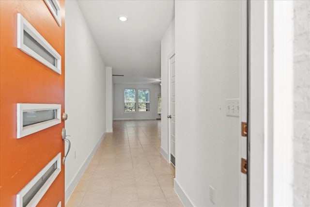 7411 Merrick Ln Unit 39, Austin, TX 78745 - corridor with light tile patterned flooring and baseboards