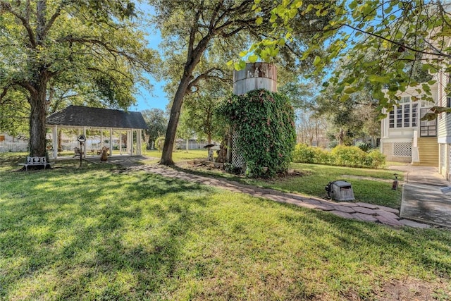 524 Saint Peter St, Gonzales, TX 78629 - view of green lawn featuring a gazebo and a carport