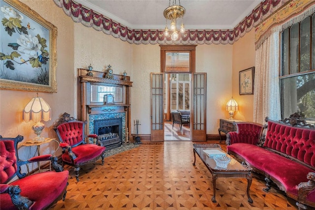 524 Saint Peter St, Gonzales, TX 78629 - living area featuring plenty of natural light, crown molding, and a fireplace with flush hearth