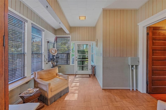 524 Saint Peter St, Gonzales, TX 78629 - sitting room with wood walls and baseboards