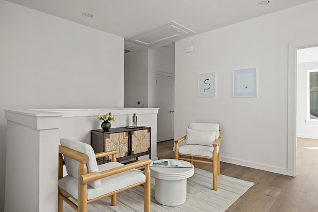 living area with wood-type flooring