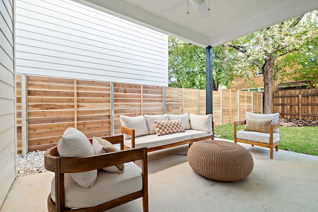 view of patio featuring an outdoor living space and ceiling fan