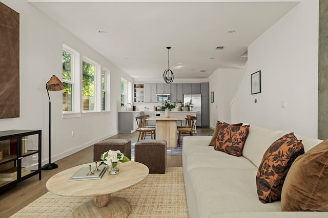 living room with light hardwood / wood-style floors