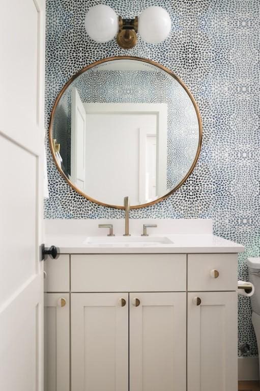 bathroom with vanity and toilet