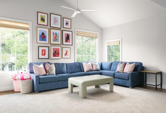 living room with ceiling fan and vaulted ceiling