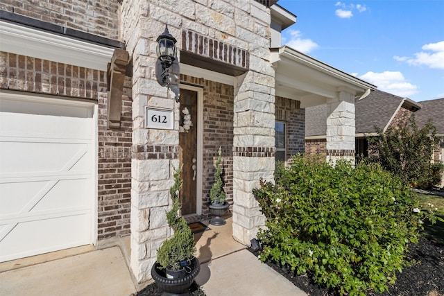 entrance to property with a garage