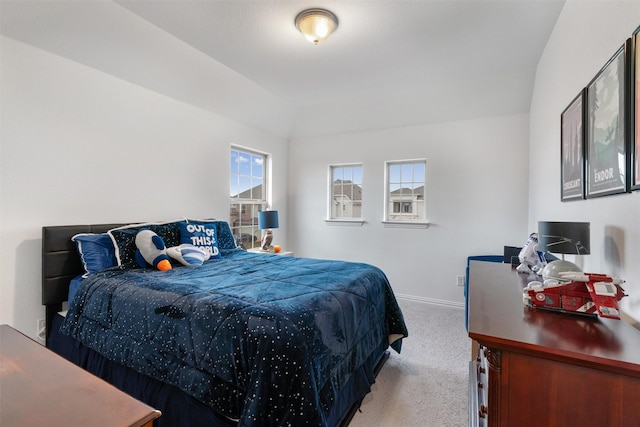 bedroom with light colored carpet