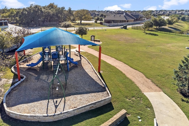 view of play area featuring a lawn