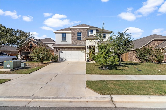 view of front facade with a front yard and a garage