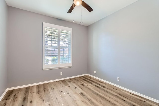 unfurnished room with light wood-type flooring and ceiling fan