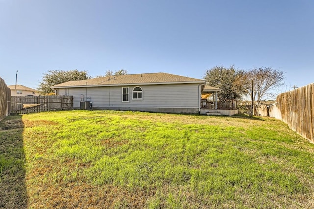 view of yard with a deck