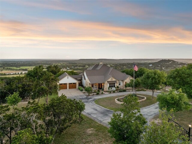 view of aerial view at dusk