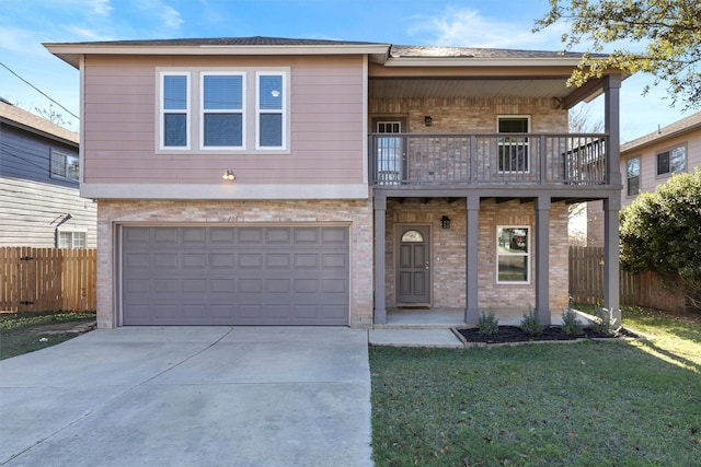 front facade with a balcony, a front lawn, and a garage