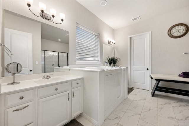 bathroom featuring vanity and an enclosed shower