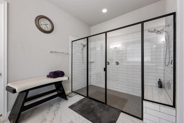 bathroom featuring tiled shower