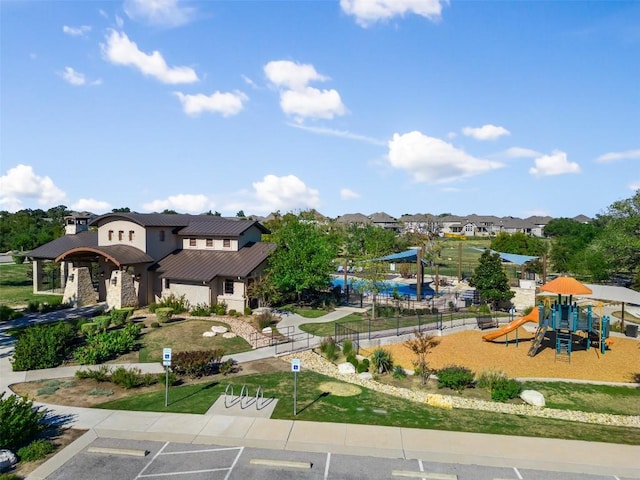 aerial perspective of suburban area with a recreational park