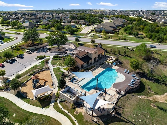 aerial perspective of suburban area with a pool