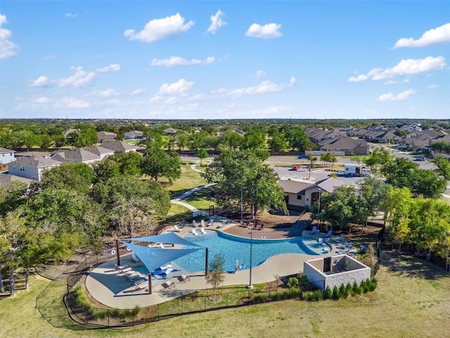 aerial view of residential area with a pool area