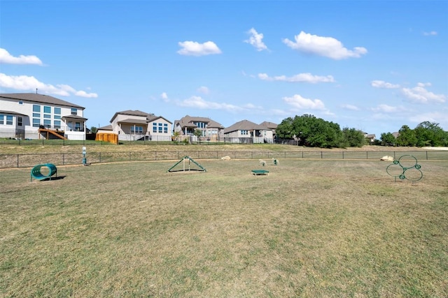 132 Ridgeview Ct, Georgetown, TX 78628 - view of yard featuring a dog friendly area and a residential view