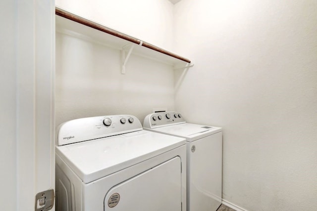 washroom featuring separate washer and dryer